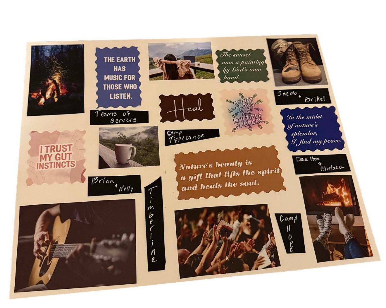 A hand-made vision board with photographs and hand-written words
